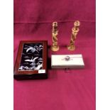 A Japanese mother of pearl inlaid box and cover; a pair of open twist candlesticks;