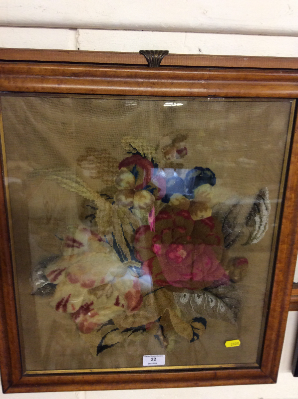 A maple framed Victorian woolwork embroidery of flower heads