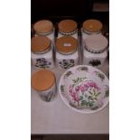 Seven Portmeirion storage jars and a Portmeirion fruit bowl