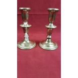 A pair of silver candlesticks