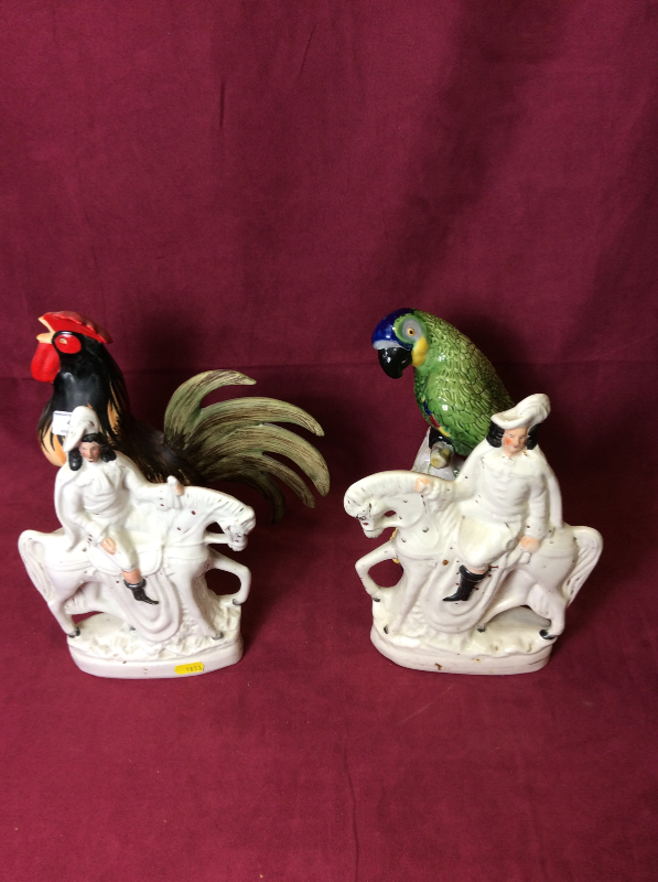 A Portuguese pottery parrot ornament; a pottery cockerel;