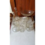 A Victorian Waterford style glass pedestal bowl; three Victorian glass decanters and stoppers;