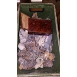 A box of minerals and stone polishing materials