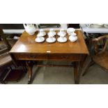 A reproduction mahogany drop leaf sofa table fitted two drawers