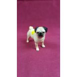 A Beswick ornament in the form of a pug