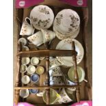A box of egg cups and teaware