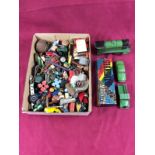 A box containing a tin plate train; marbles; a set of Dominoes etc.