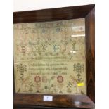 A Victorian needlework sampler, named to Elizabeth Farrow,