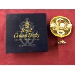 A Royal Crown Derby bone china 'Old Imari' patterned chamber stick and snuffer,