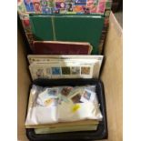 A box of stamps and albums