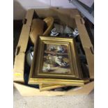 A box containing prints; two oil lamps;