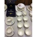 A quantity of floral decorated teaware and Royal Doulton 'Minerva' teaware