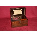 A Victorian rosewood single compartment tea caddy