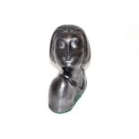 An Art metal bust of a pouting girl, 13cm high