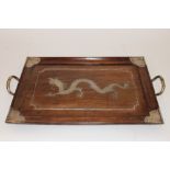 A Chinese hardwood and silver inlaid two handled tea tray, with dragon decoration, 60cm