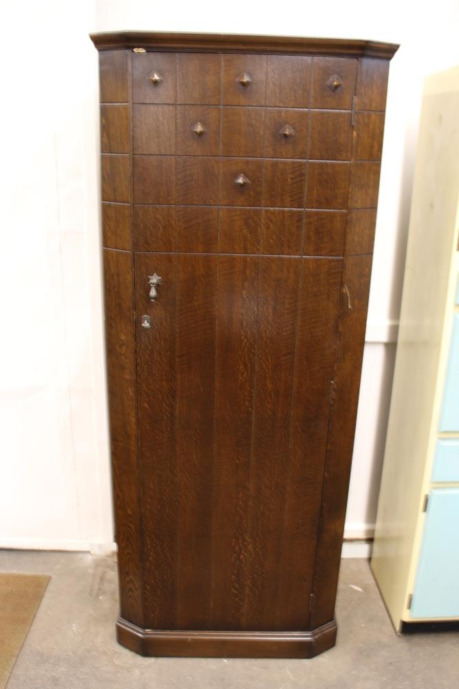A 1930's oak hall wardrobe, 73cm wide
