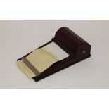 A Bakelite desk notepad holder 18cm