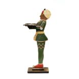 A wooden and metal dumb waiter, in the form of an Indian footman, 79.5cm high