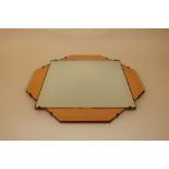 An Art Deco colured glass bevel adged wall mirror, 50cm x 50cm in extremes