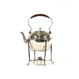 A silver plated spirit kettle on stand