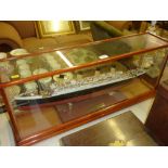 A model of RMS Titanic contained in glazed case