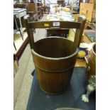 A wooden well bucket