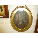 A gilt framed study depicting perched birds within