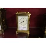 A brass cased carriage clock