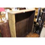 A stripped mahogany and open book shelf