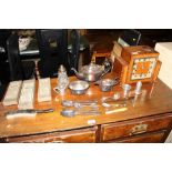 A silver plated three piece teaset; various cutler