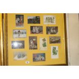 A framed collection of post-cards depicting cats