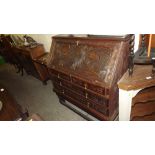 Anglo Indian carved hardwood bureau depicting elep