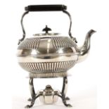 A silver plated half fluted spirit kettle on stand