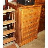 A stripped pine side cupboard disguised as a chest