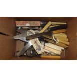 A box of mostly knives