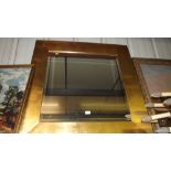 A large gilt framed wall mirror