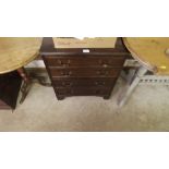 A mahogany chest fitted four long drawers of small