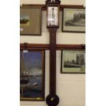 A modern mahogany stick barometer by Comitti and S