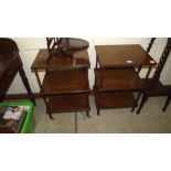 A pair of mahogany three tier tables raised on bra