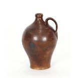 An 18th Century salt glazed baluster one gallon flagon, 33cm high