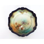 An early 20th Century Bavarian porcelain part dessert service, comprising two large comports, four