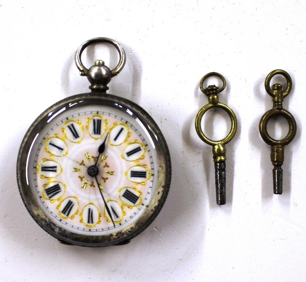 A ladies silver cased fob watch and key