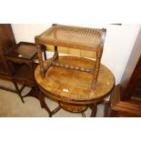 An oak and cane seated stool; and a walnut veneere