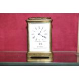 A brass cased carriage clock