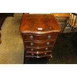 A reproduction mahogany serpentine front chest fit