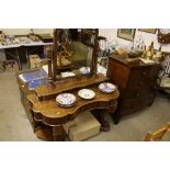 A Victorian mahogany Duchess dressing table fitted