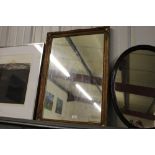 A gilt framed wall mirror; together with a mahogan