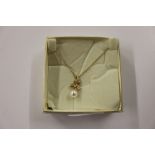 A 18ct gold diamond and pearl set necklace