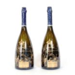 A pair of Duval-Leroy champagne bottles with gilt