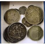 A collection of various silver and other coins